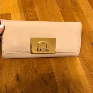 A beige clutch